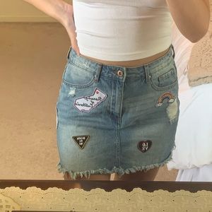 Denim skirt with patches